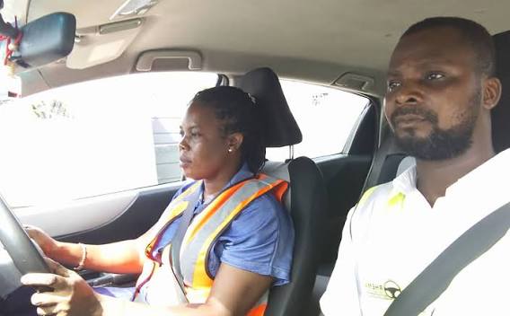 A woman learning how to drive