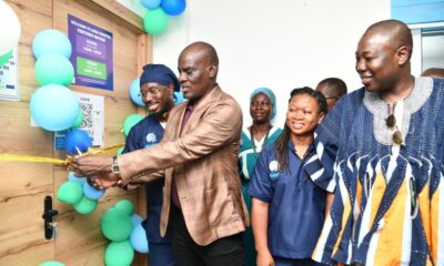 Mr Haruna Iddrissu cutting the tape to officially commission the IVF surgical ward. With him us Dr Sheila and founder of Aisha Hospital Dr Doliwura Zakaria (right)