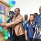 Mr Haruna Iddrissu cutting the tape to officially commission the IVF surgical ward. With him us Dr Sheila and founder of Aisha Hospital Dr Doliwura Zakaria (right)