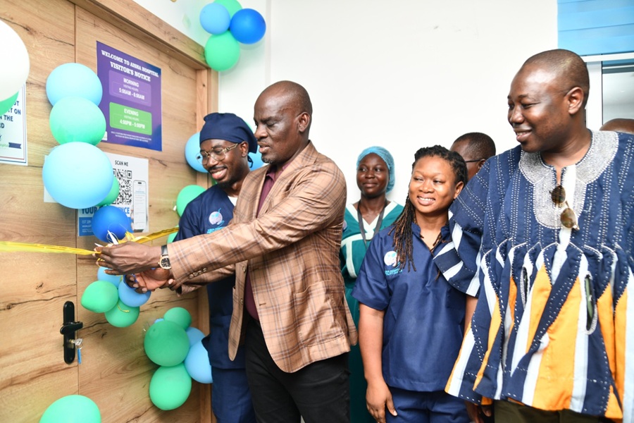 Mr Haruna Iddrissu cutting the tape to officially commission the IVF surgical ward. With him us Dr Sheila and founder of Aisha Hospital Dr Doliwura Zakaria (right)