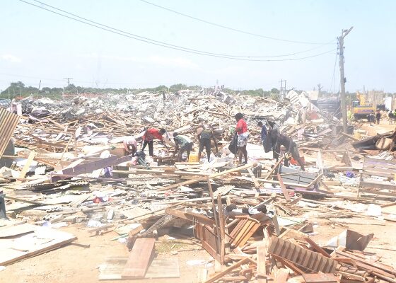 Some victims salveging their belongings after the demolitioning exercise at the Laboma Beach Resort Photo Victor A. Buxton (19)