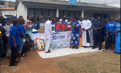 • The Diocesan Mothers’ Union of the Anglican Diocese Presenting items to Street Academy