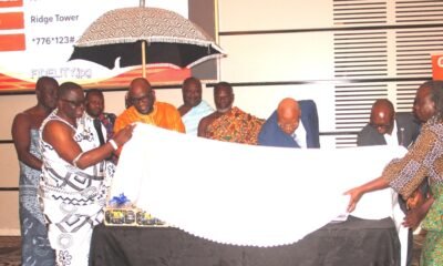 Nii Kojo Ashirifi Papanyira I [left] unveiling the package being assisted by Prof Joshua Alabi [fourth from right] Prof Acakpovi [second from left] to launch the Endowment Fund Photo Okai Elizabeth.