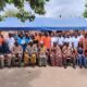 Officials from UNFPA and participants at the workshop