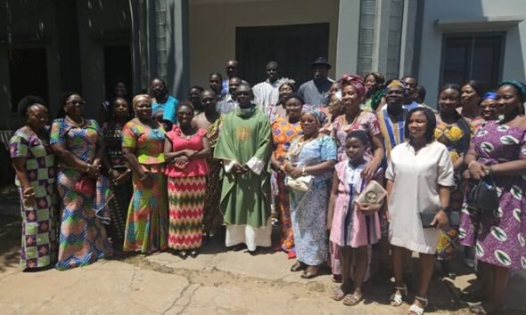 • Staff of the Accra Psychiatric Hospital in a group photograph with the Parish Priest of SS. Anne and Joachim Catholic Church, Teshie, Very Rev. Fr. Raymond Osei-Tutu