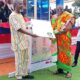 Professor Komla Tsey( left) presenting a citation to a distinguished member of the church