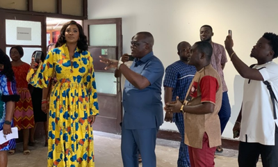 • Executive Secretary of NFA Kafui Danku-Pitcher in a conversation with Mr Wakefield Ackuaku during the tour